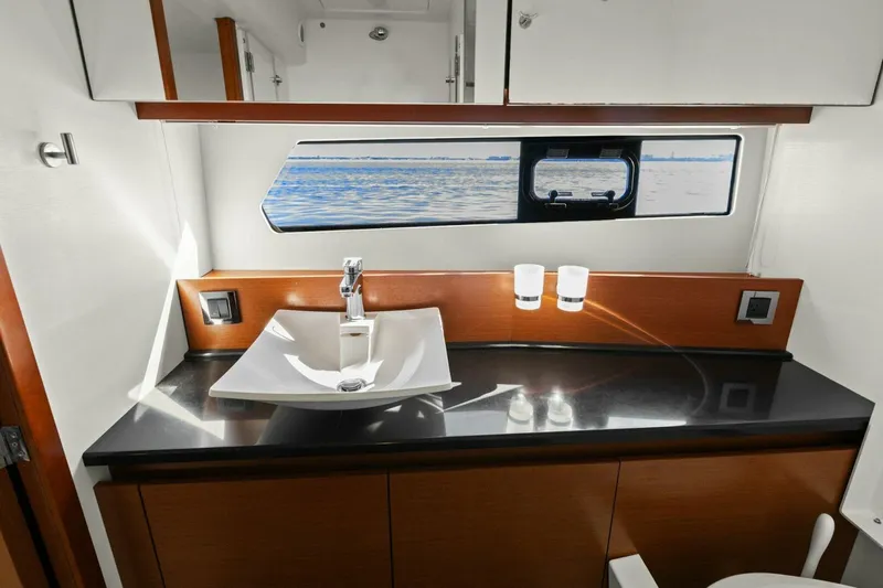 Slainte Yacht Photos Pics Luxurious bathroom interior of 2014 Prestige 450 S yacht with ocean view.