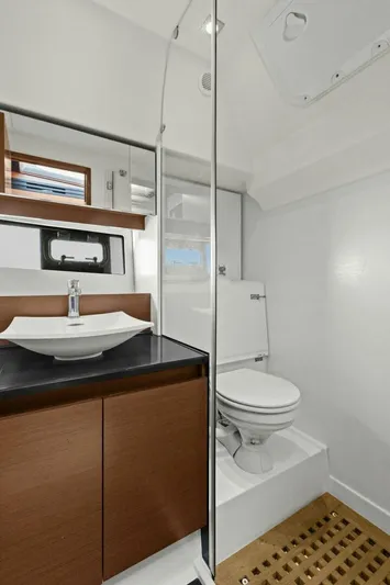 Slainte Yacht Photos Pics Luxurious bathroom in 2014 Prestige 450 S yacht with modern fixtures.