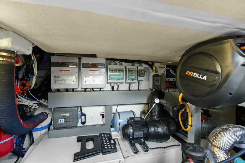 Slainte Yacht Photos Pics Engine room of 2014 Prestige 450 S yacht with electrical panels and equipment.