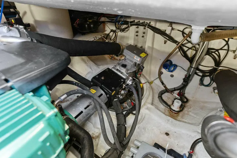 Slainte Yacht Photos Pics Engine compartment of 2014 Prestige 450 S yacht, showcasing mechanical components and wiring.