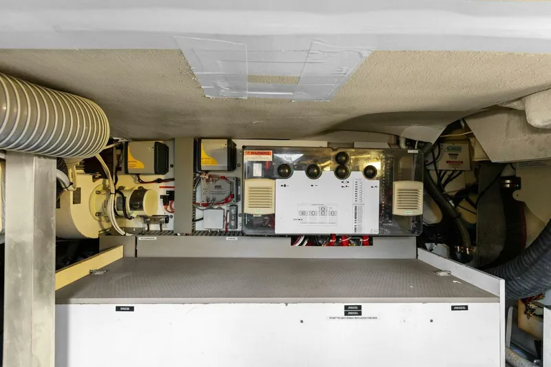 Slainte Yacht Photos Pics Engine room of 2014 Prestige 450 S yacht, showcasing mechanical components and systems.