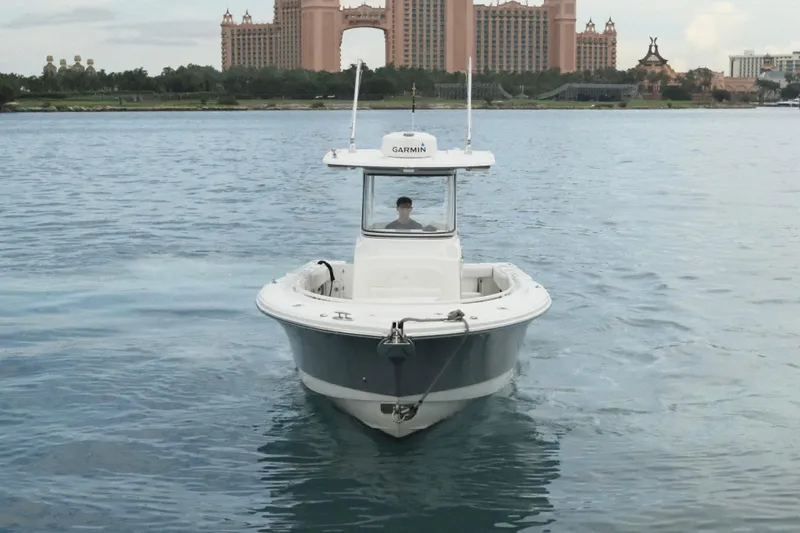  Yacht Photos Pics 2019 Edgewater Prince boat on water with resort in background.