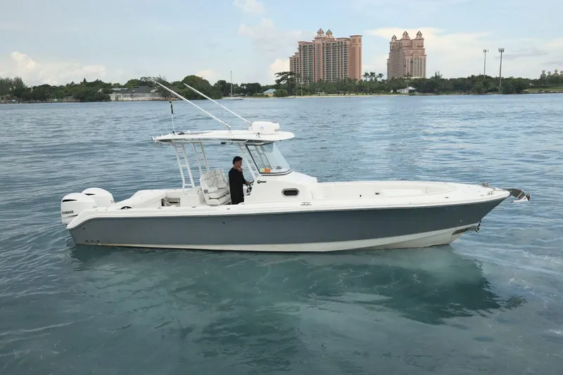  Yacht Photos Pics 2019 Edgewater Prince boat on water with cityscape background.