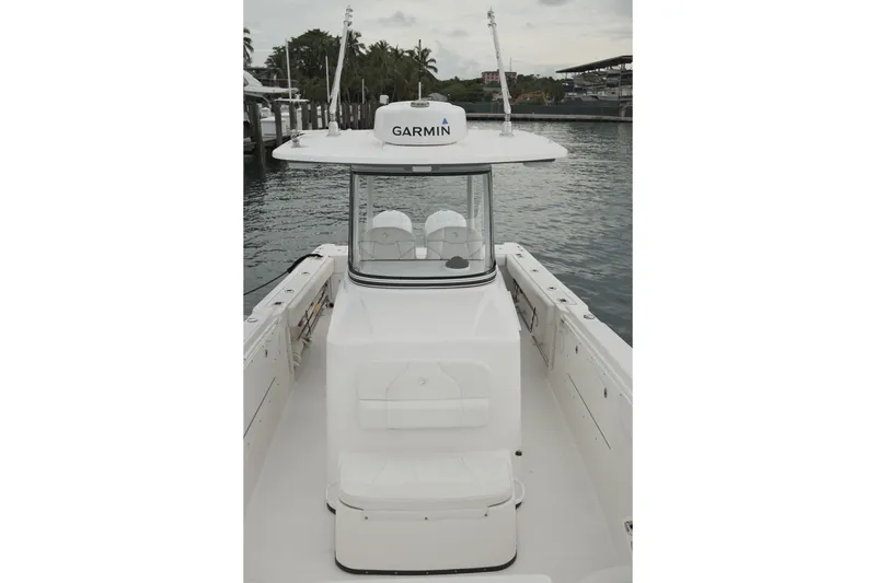  Yacht Photos Pics 2019 Edgewater Prince boat with Garmin equipment, docked in a marina.