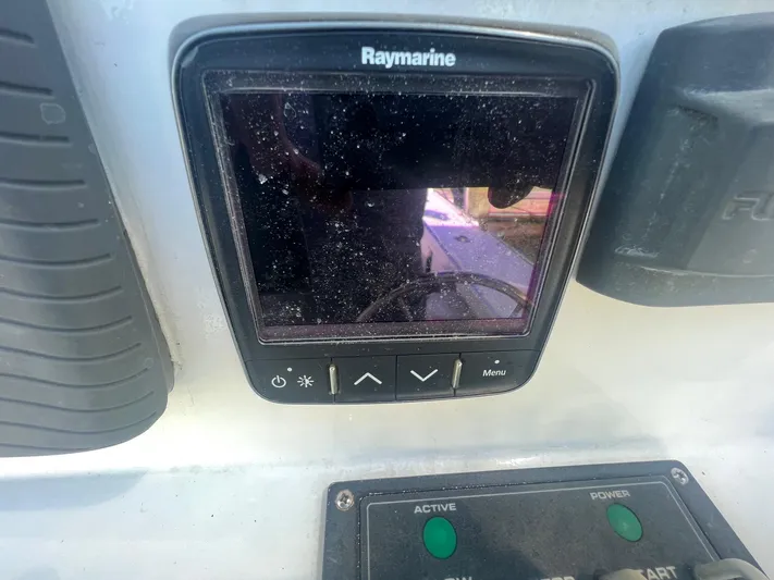  Yacht Photos Pics Raymarine display on 2003 H&H Marine 42 Downeast boat dashboard.