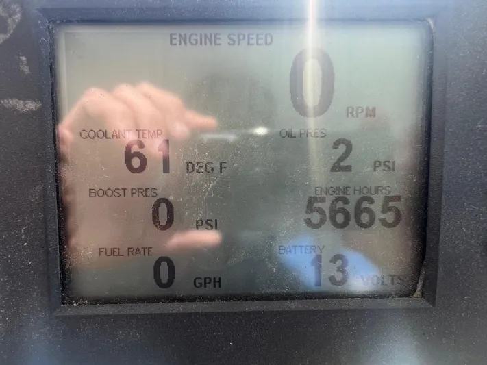  Yacht Photos Pics Dashboard display of a 2003 H&H Marine 42 Downeast boat showing engine metrics.
