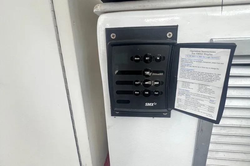  Yacht Photos Pics Control panel on a 2003 H&H Marine 42 Downeast boat with instruction manual.