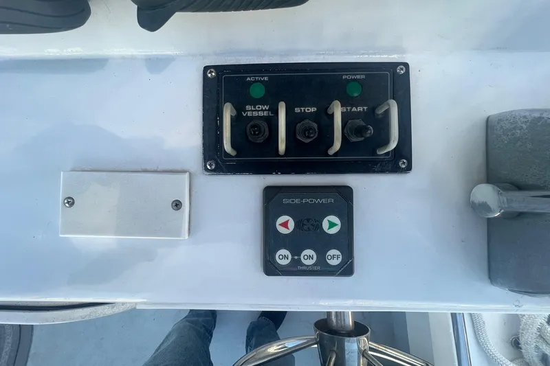  Yacht Photos Pics Control panel of a 2003 H&H Marine 42 Downeast boat with switches and indicators.