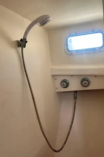  Yacht Photos Pics Shower area in 2003 H&H Marine 42 Downeast boat with window and controls.