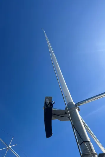  Yacht Photos Pics Antenna on 2003 H&H Marine 42 Downeast boat against clear blue sky.