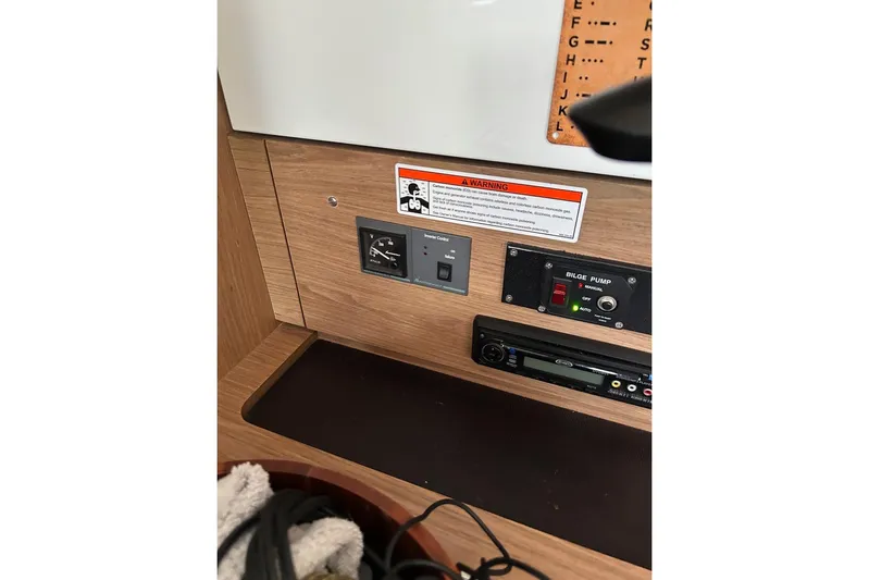 Cruzeiro Do Sul Yacht Photos Pics Control panel of a 2013 Jeanneau Sun Odyssey 44 DS sailboat interior.