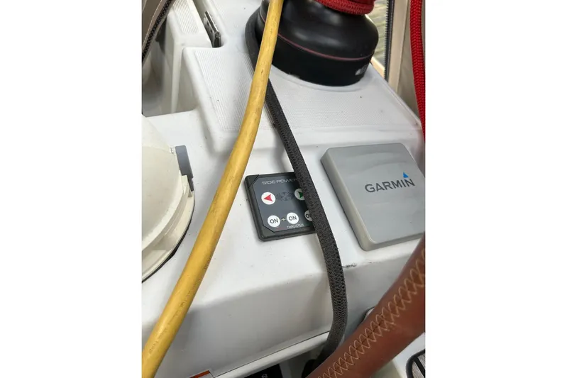 Cruzeiro Do Sul Yacht Photos Pics Control panel on 2013 Jeanneau Sun Odyssey 44 DS with Garmin device and cables.