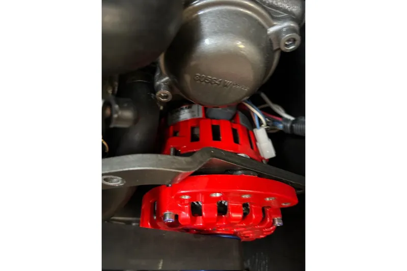 Cruzeiro Do Sul Yacht Photos Pics Red alternator in a 2013 Jeanneau Sun Odyssey 44 DS engine compartment.