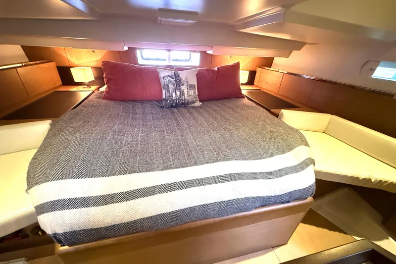 Cruzeiro Do Sul Yacht Photos Pics Luxurious cabin interior of 2013 Jeanneau Sun Odyssey 44 DS yacht with cozy bedding.