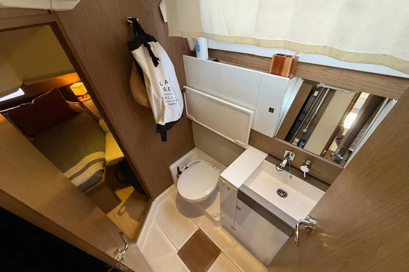 Cruzeiro Do Sul Yacht Photos Pics Compact bathroom in 2013 Jeanneau Sun Odyssey 44 DS yacht, featuring modern fixtures and cozy design.
