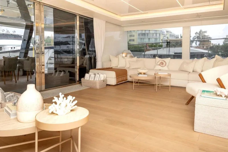 Fat Cat Yacht Photos Pics Luxurious interior of 2024 Sunreef 80 Power yacht with elegant seating and decor.