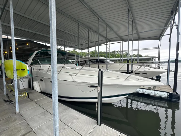  Yacht Photos Pics 2000 Formula 40 PC yacht docked under covered marina.