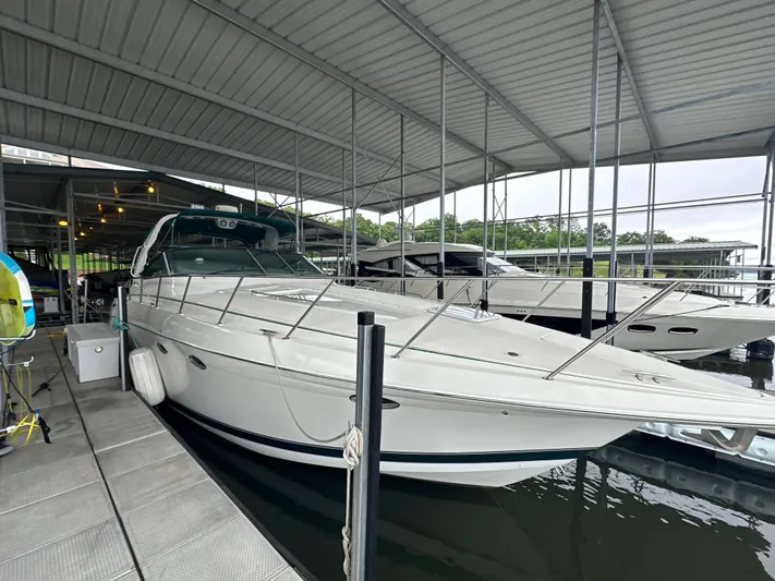  Yacht Photos Pics 2000 Formula 40 PC yacht docked in a covered marina.