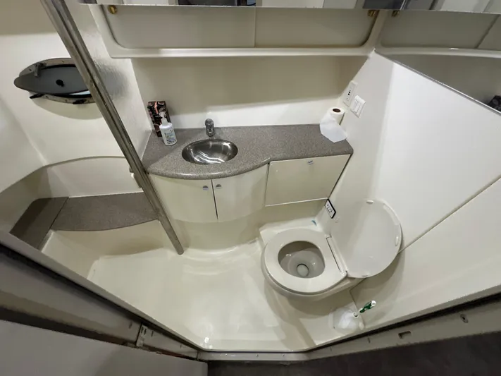 Yacht Photos Pics Bathroom interior of a 2000 Formula 40 PC yacht, featuring sink and toilet.