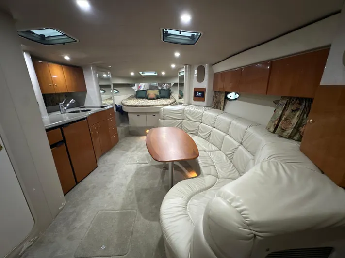  Yacht Photos Pics Luxurious interior of a 2000 Formula 40 PC yacht with leather seating and modern amenities.