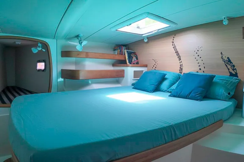 Katara Yacht Photos Pics Luxurious cabin interior of 2005 Leopard 43 yacht with modern decor and natural light.