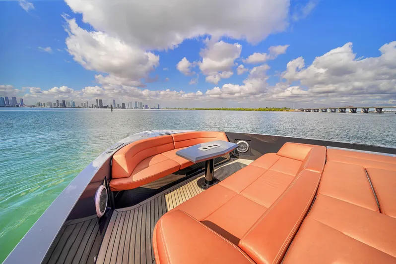  Yacht Photos Pics Luxurious 2020 Vanquish VQ58 yacht with spacious deck and stunning waterfront view.