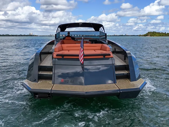  Yacht Photos Pics Luxury 2020 Vanquish VQ58 yacht on open water, rear view.