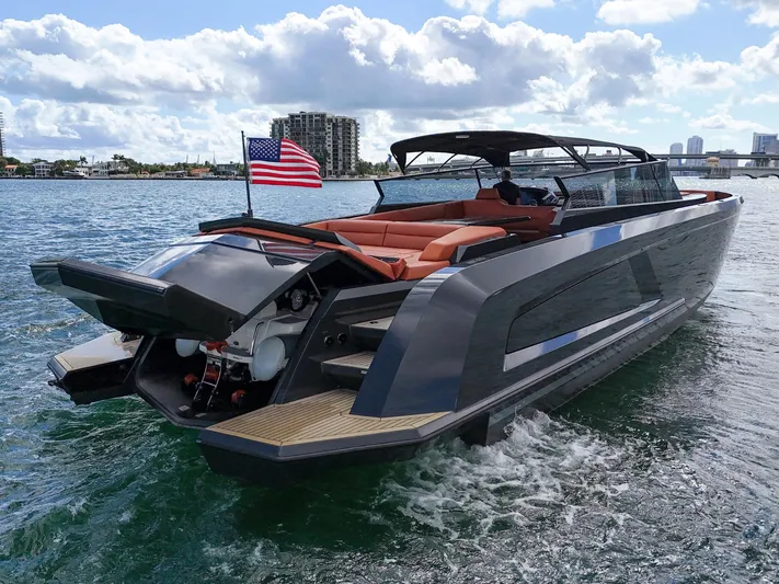  Yacht Photos Pics Luxury 2020 Vanquish VQ58 yacht cruising on a sunny day.