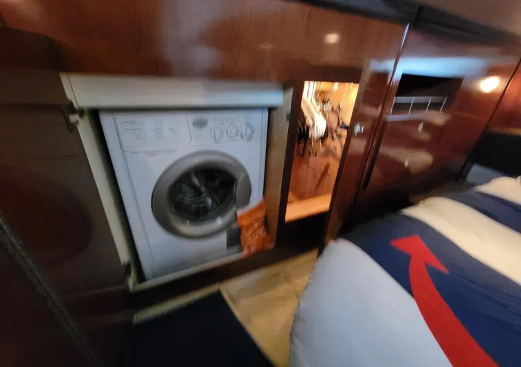 'aquaholic' Yacht Photos Pics Washer/Dryer in Guest stateroom
