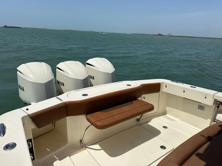  Yacht Photos Pics 2015 Scout 350 LXF boat with Yamaha engines on open water.