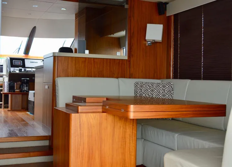 La Nonna Yacht Photos Pics 2017 Sunseeker Manhattan 65 yacht interior with modern wood and leather furnishings.