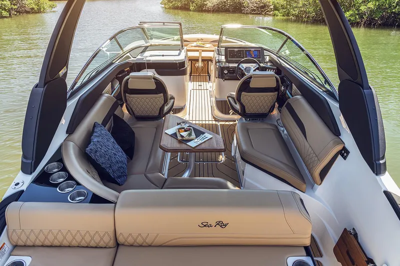  Yacht Photos Pics Manufacturer Provided Image: Luxurious 2025 Sea Ray SLX 260 boat interior with plush seating and modern dashboard.