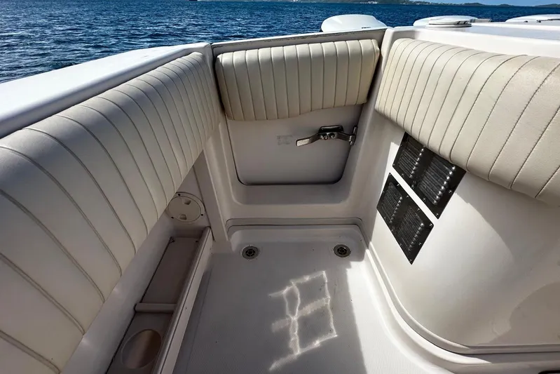  Yacht Photos Pics 2006 Grady-White Express 360 boat interior with cushioned seating and ocean view.