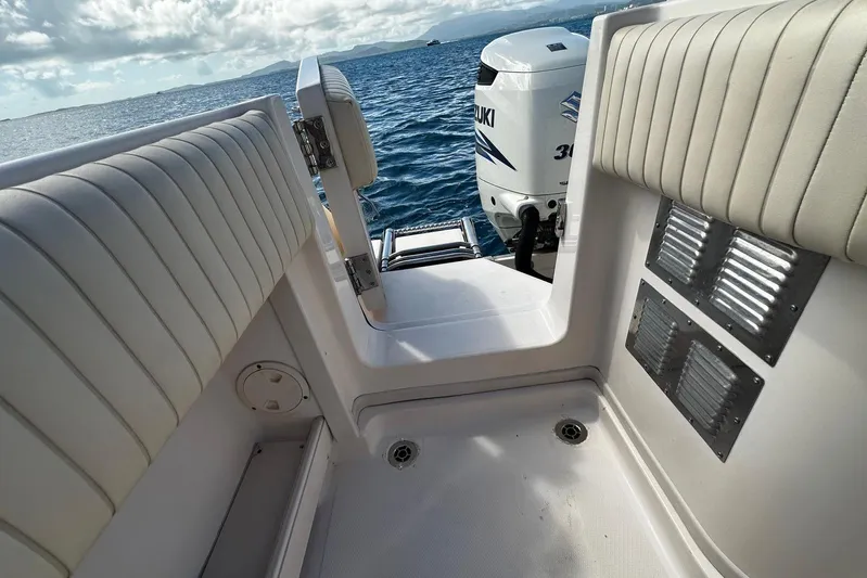  Yacht Photos Pics 2006 Grady-White Express 360 boat interior with Suzuki engine, ocean view.