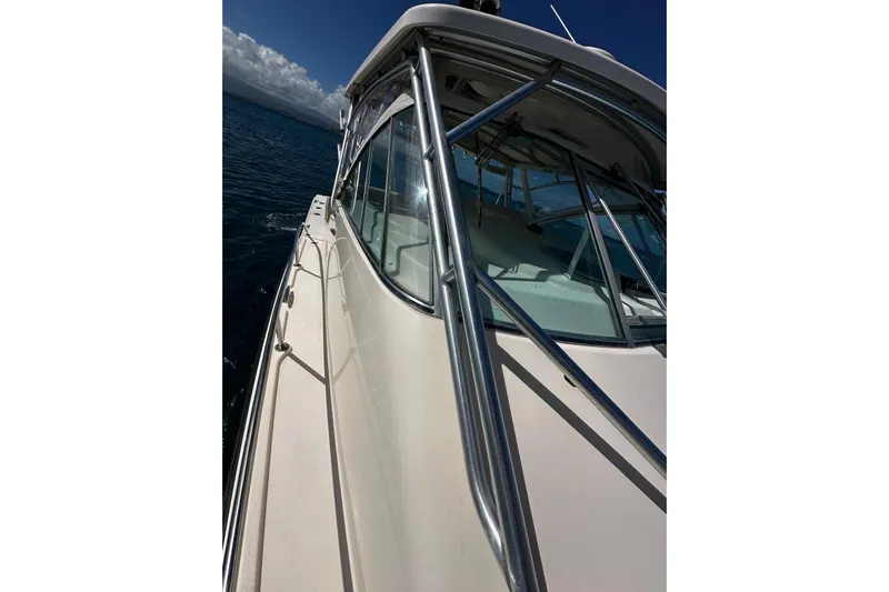  Yacht Photos Pics 2006 Grady-White Express 360 boat on open water, showcasing sleek design and sturdy structure.