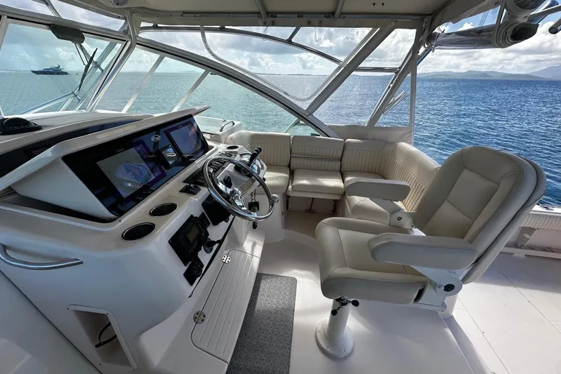  Yacht Photos Pics 2006 Grady-White Express 360 boat interior with helm, seating, and ocean view.