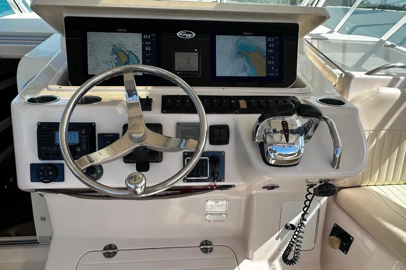  Yacht Photos Pics 2006 Grady-White Express 360 helm with navigation screens and controls.