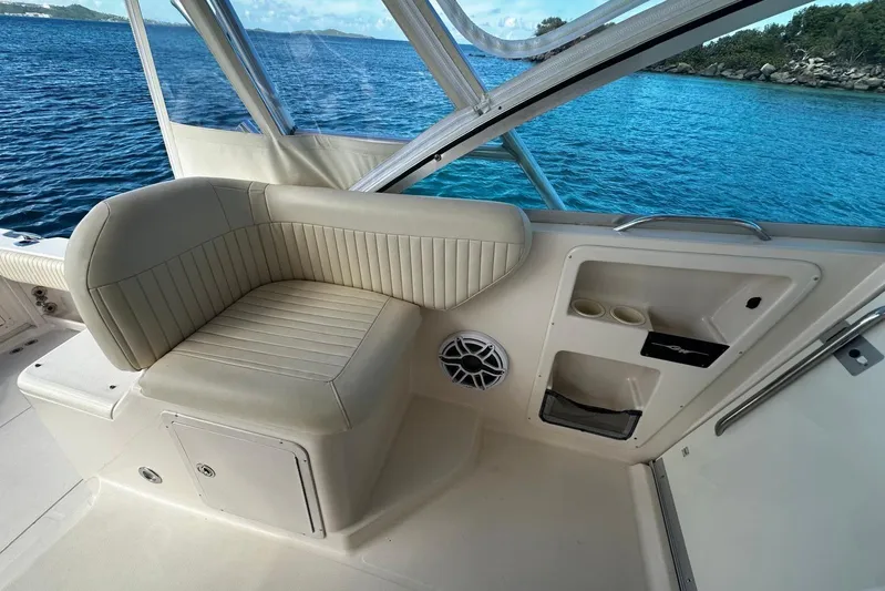  Yacht Photos Pics 2006 Grady-White Express 360 boat interior with seating, cup holders, and ocean view.