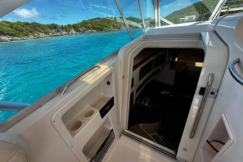  Yacht Photos Pics 2006 Grady-White Express 360 boat interior with ocean view and lush coastline.