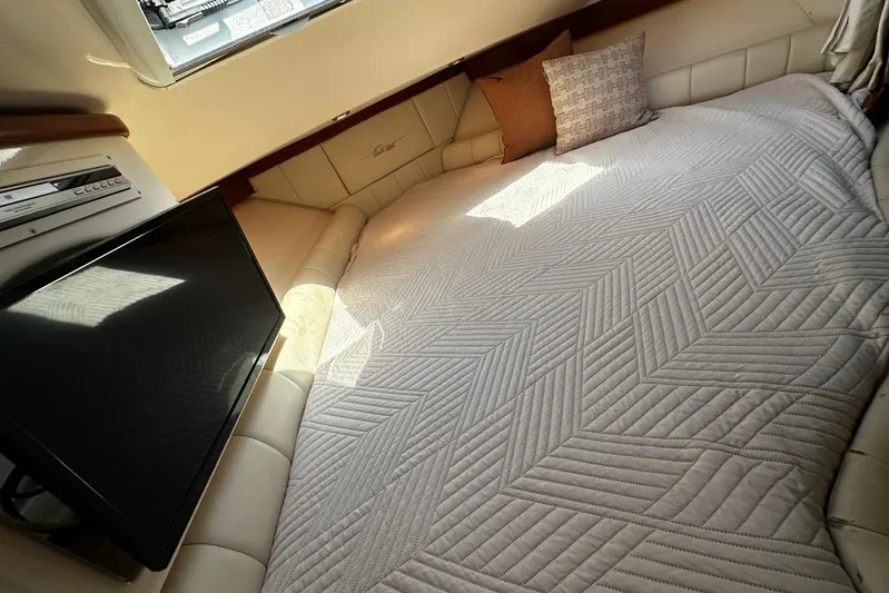  Yacht Photos Pics Interior cabin of 2006 Grady-White Express 360 with bed and TV.