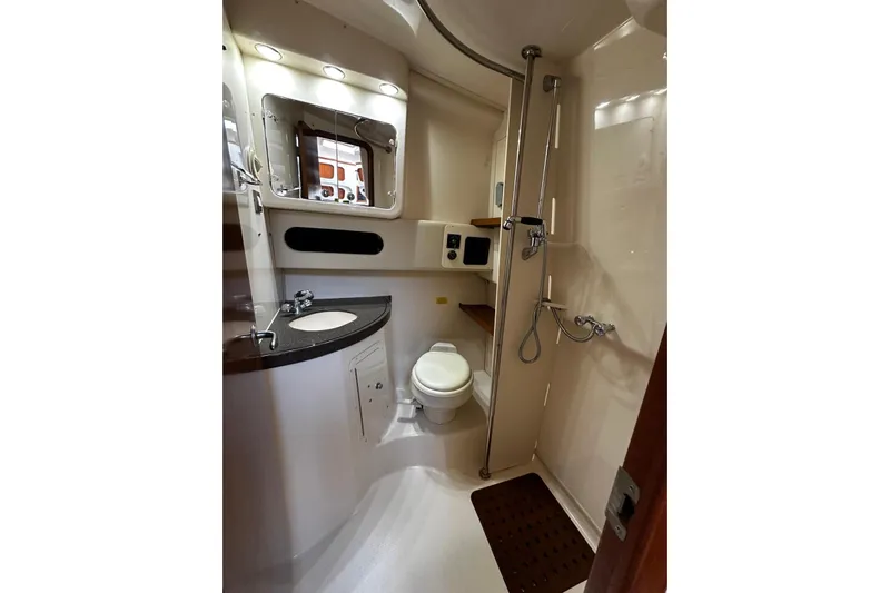  Yacht Photos Pics 2006 Grady-White Express 360 boat bathroom with shower, sink, and toilet.
