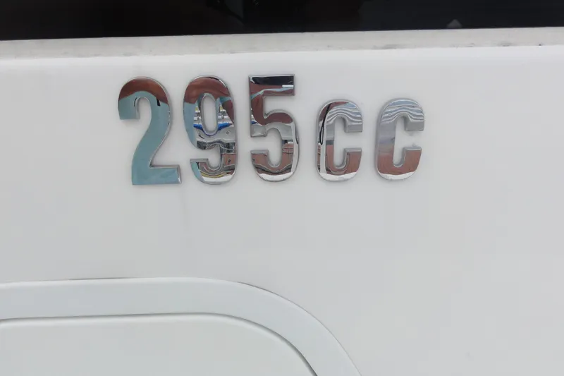  Yacht Photos Pics Chrome '295 CC' emblem on 2016 Everglades 295 Center Console boat.