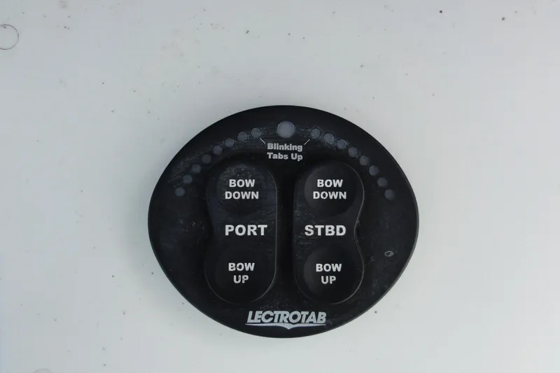  Yacht Photos Pics Control panel for Everglades 295 Center Console 2016 boat, featuring bow adjustment buttons.