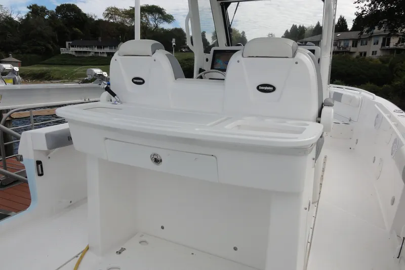 Yacht Photos Pics 2016 Everglades 295 Center Console boat interior with dual seats and control panel.