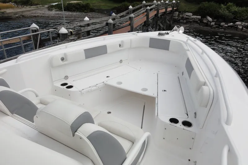  Yacht Photos Pics 2016 Everglades 295 Center Console boat interior with white seating and cup holders.