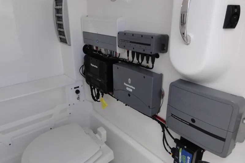  Yacht Photos Pics 2016 Everglades 295 Center Console interior with Raymarine electronics and control units.