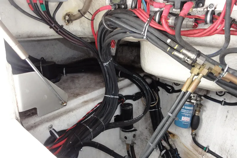 Yacht Photos Pics 2016 Everglades 295 Center Console engine compartment with wiring and fuel filter.