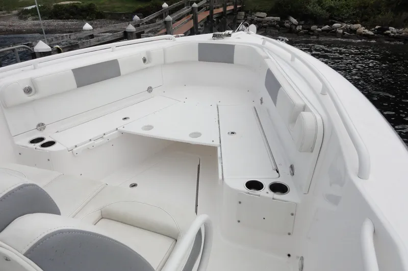  Yacht Photos Pics 2016 Everglades 295 Center Console boat interior with seating and cup holders.
