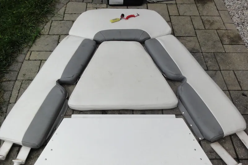  Yacht Photos Pics Cushion set for 2016 Everglades 295 Center Console boat on stone pavement.