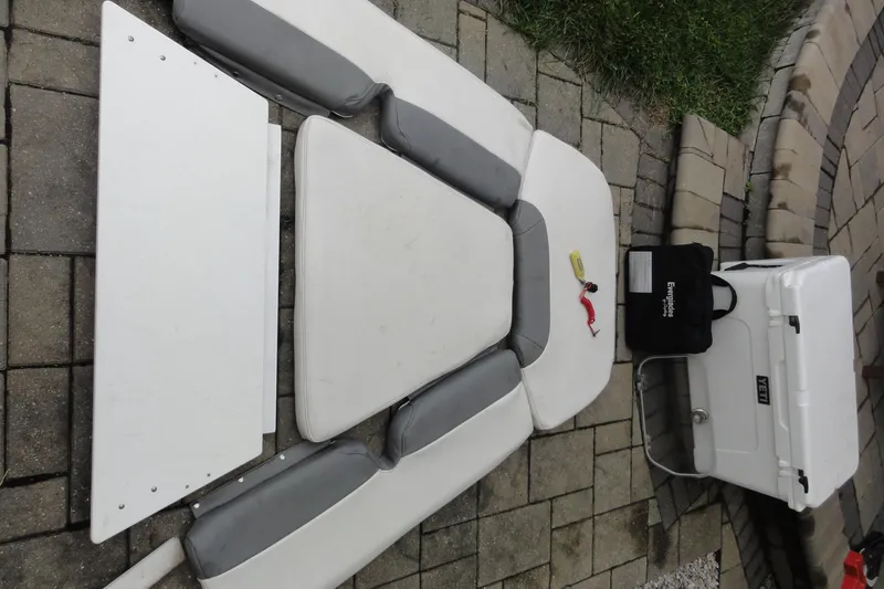  Yacht Photos Pics Cushions and accessories for 2016 Everglades 295 Center Console on stone patio.